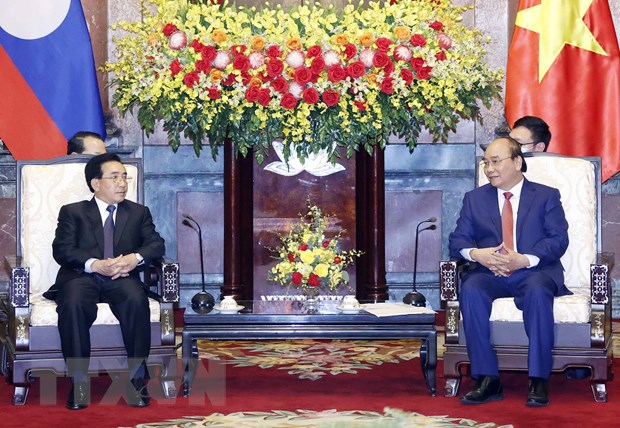 Chủ tịch nước chào mừng Thủ tướng Lào ‘xông đất’ Việt Nam đầu năm 2022 - Ảnh 1.