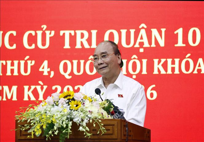 Chủ tịch nước Nguyễn Xuân Phúc tiếp xúc cử tri TPHCM - Ảnh 3.