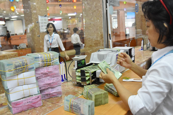Sửa quy định nhà đầu tư nước ngoài mua cổ phần của tổ chức tín dụng Việt Nam - Ảnh 1.