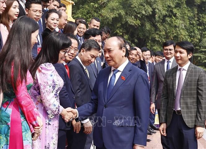 Chủ tịch nước Nguyễn Xuân Phúc gặp mặt các doanh nhân trẻ Việt Nam tiêu biểu năm 2022 - Ảnh 3.