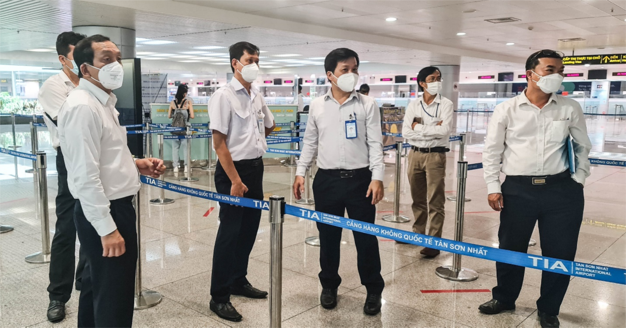 Cải tiến quy trình kiểm y tế đối với người nhập cảnh tại sân bay Tân Sơn Nhất - Ảnh 2.