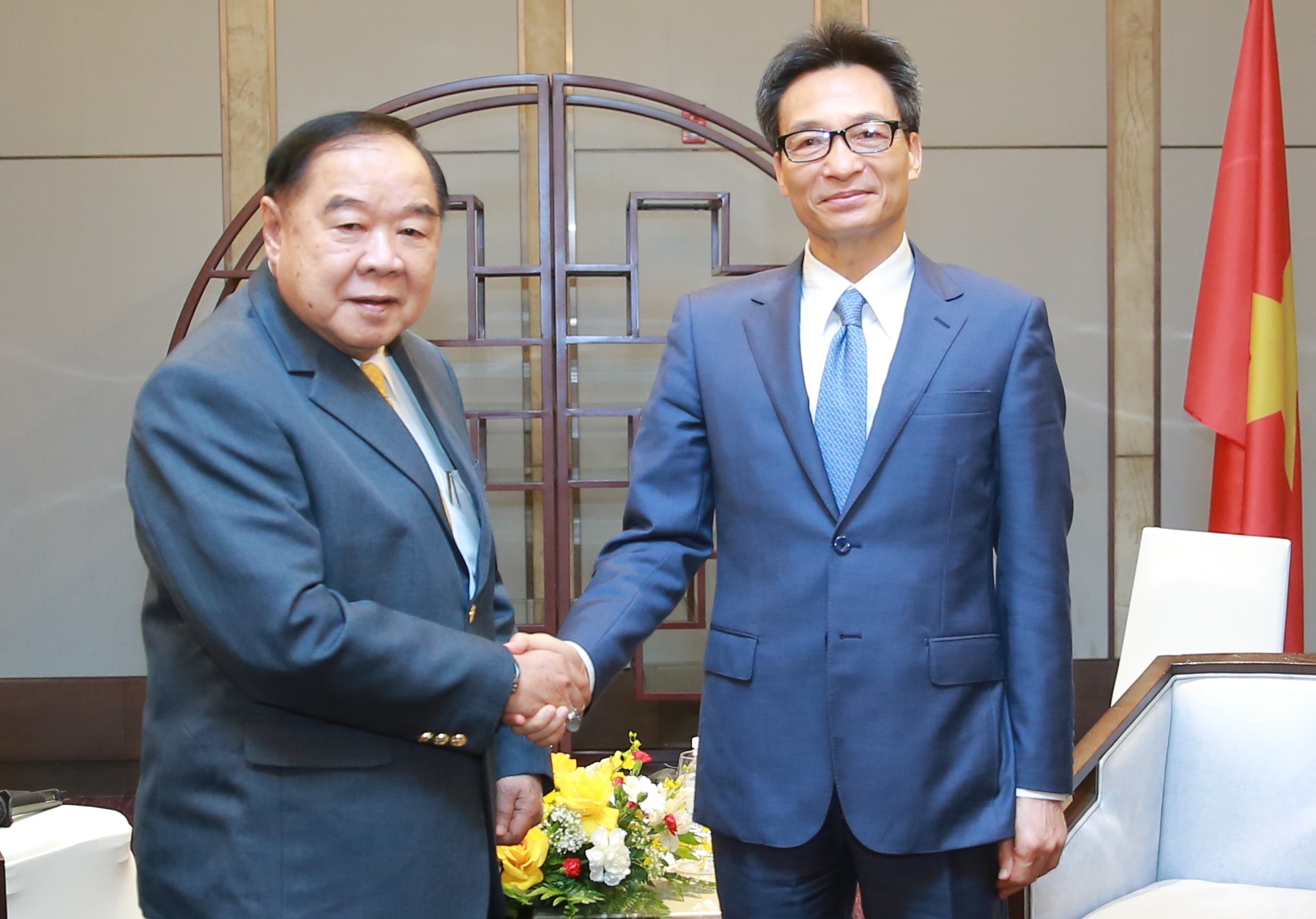 Phó Thủ tướng Vũ Đức Đam tiếp Phó Thủ tướng kiêm Chủ tịch Ủy ban Olympic quốc gia Thái Lan - Ảnh 1.