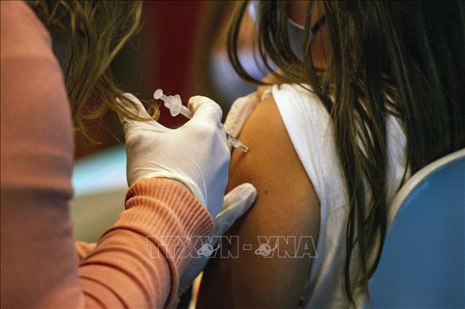 Australia nghiên cứu phát triển vaccine hiệu quả với mọi biến thể của SARS-CoV-2 - Ảnh 1. Australia nghiên cứu phát triển vaccine hiệu quả với mọi biến thể của SARS-CoV-2 - Ảnh 1.