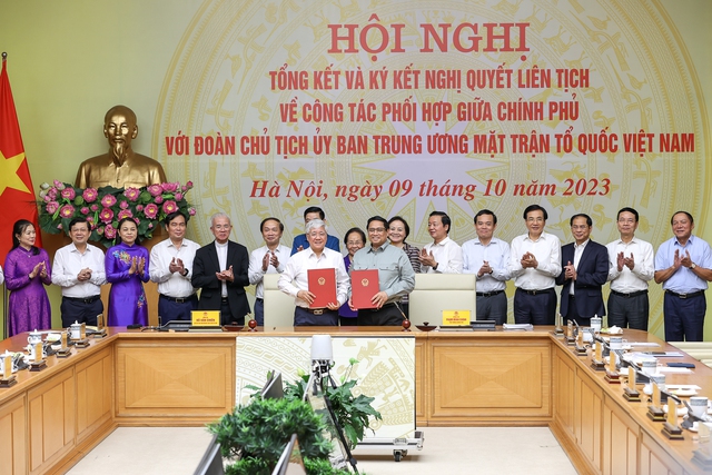 Hội nghị tổng kết và ký kết Nghị quyết liên tịch giữa Chính phủ và Đoàn Chủ tịch Ủy ban Trung ương MTTQ Việt Nam - Ảnh 1.