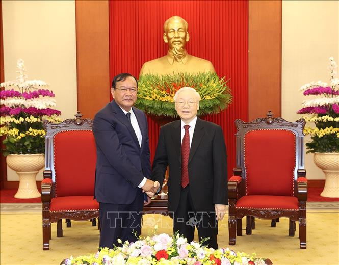 Tổng Bí thư Nguyễn Phú Trọng tiếp Trưởng Ban Đối ngoại Trung ương Đảng Nhân dân Campuchia - Ảnh 1.
