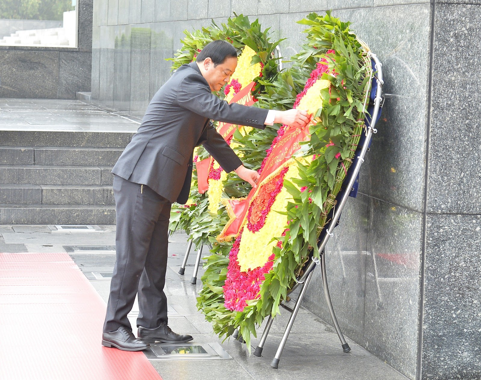 Chùm ảnh: Lễ đón trọng thể Thủ tướng Lào Sonexay Siphandone thăm chính thức Việt Nam- Ảnh 3.