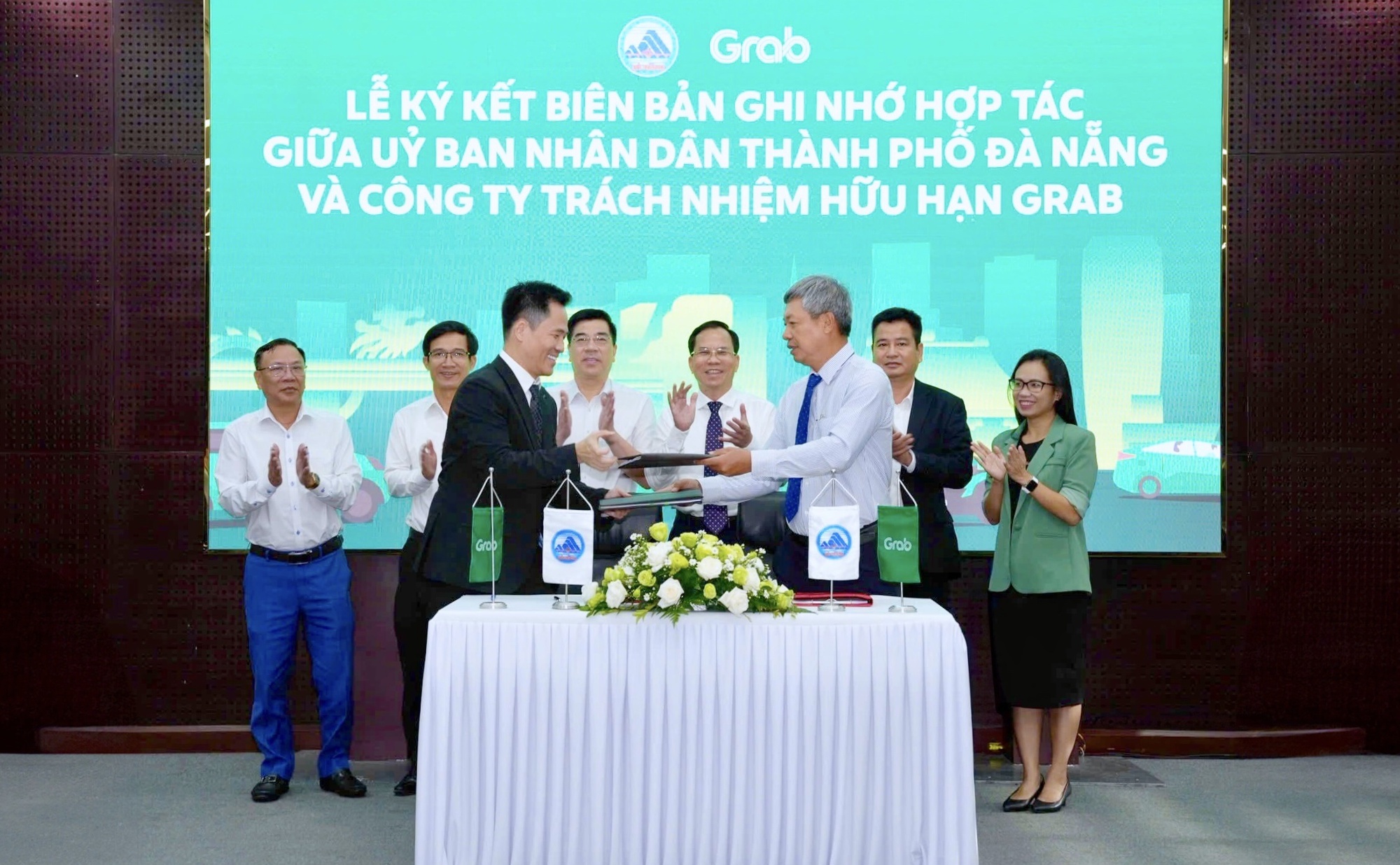 TP Đà Nẵng và Grab Việt Nam hợp tác thúc đẩy chuyển đổi số- Ảnh 1. TP Đà Nẵng và Grab Việt Nam hợp tác thúc đẩy chuyển đổi số- Ảnh 1.