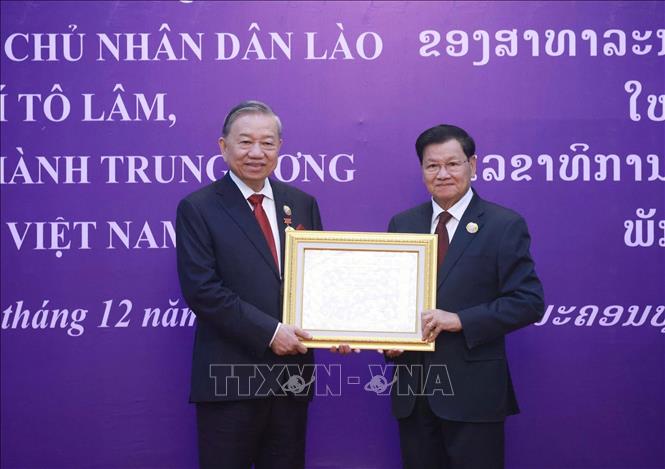 Tổng Bí thư Tô Lâm nhận Huân chương Vàng Quốc gia của Nhà nước Lào- Ảnh 4.