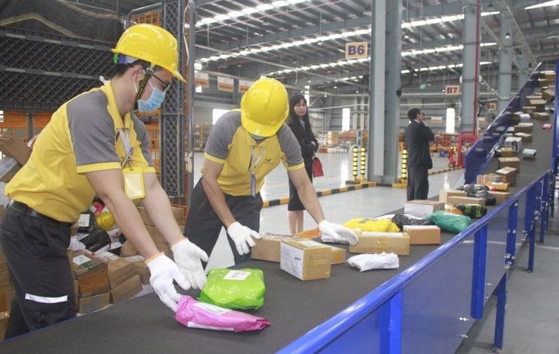 Hoàn thiện khuôn khổ pháp luật, thúc đẩy chuyển đổi số, phát triển hạ tầng bưu chính số- Ảnh 1.