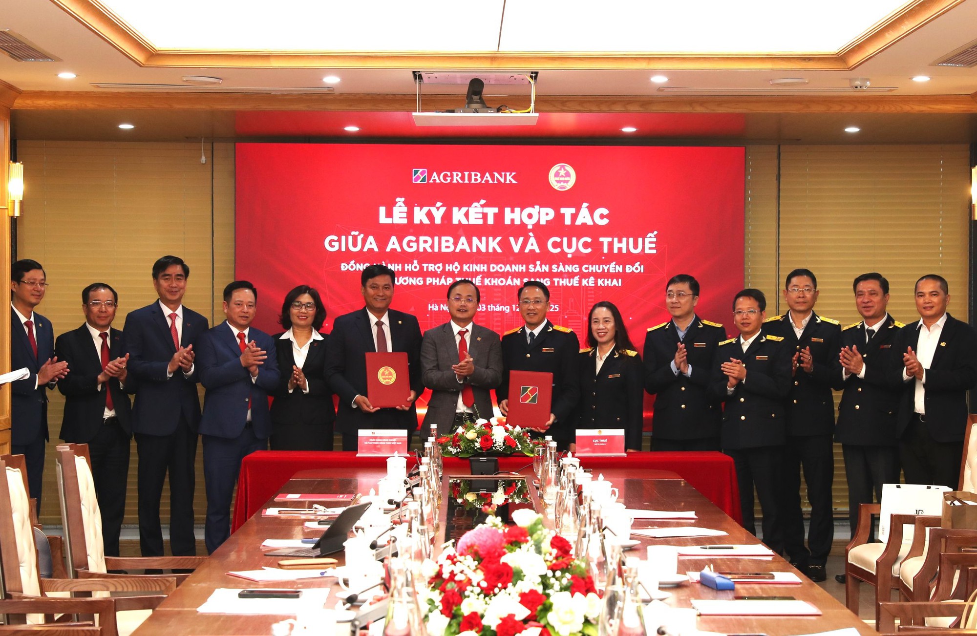 Agribank ‘bắt tay’ ngành Thuế, tăng tốc hỗ trợ hộ kinh doanh chuyển đổi- Ảnh 1. Agribank ‘bắt tay’ ngành Thuế, tăng tốc hỗ trợ hộ kinh doanh chuyển đổi- Ảnh 1.