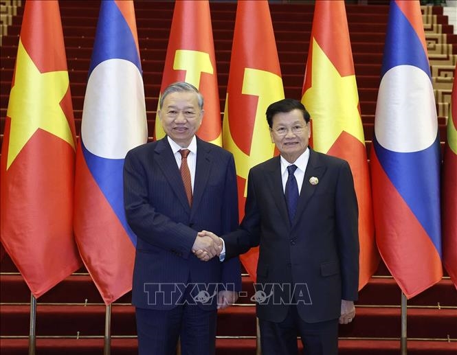 Tăng cường quan hệ hợp tác giữa Đảng Cộng sản Việt Nam và Đảng Nhân dân Cách mạng Lào- Ảnh 1.