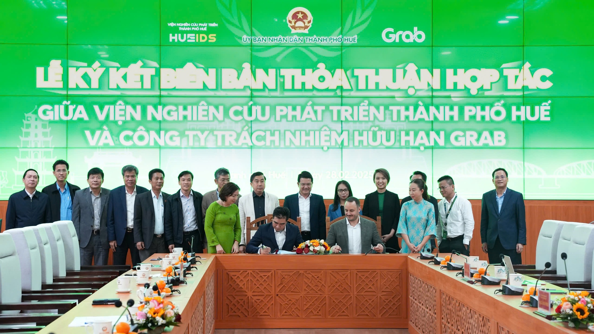 TP.Huế và Grab Việt Nam hợp tác thúc đẩy chuyển đổi số- Ảnh 1.