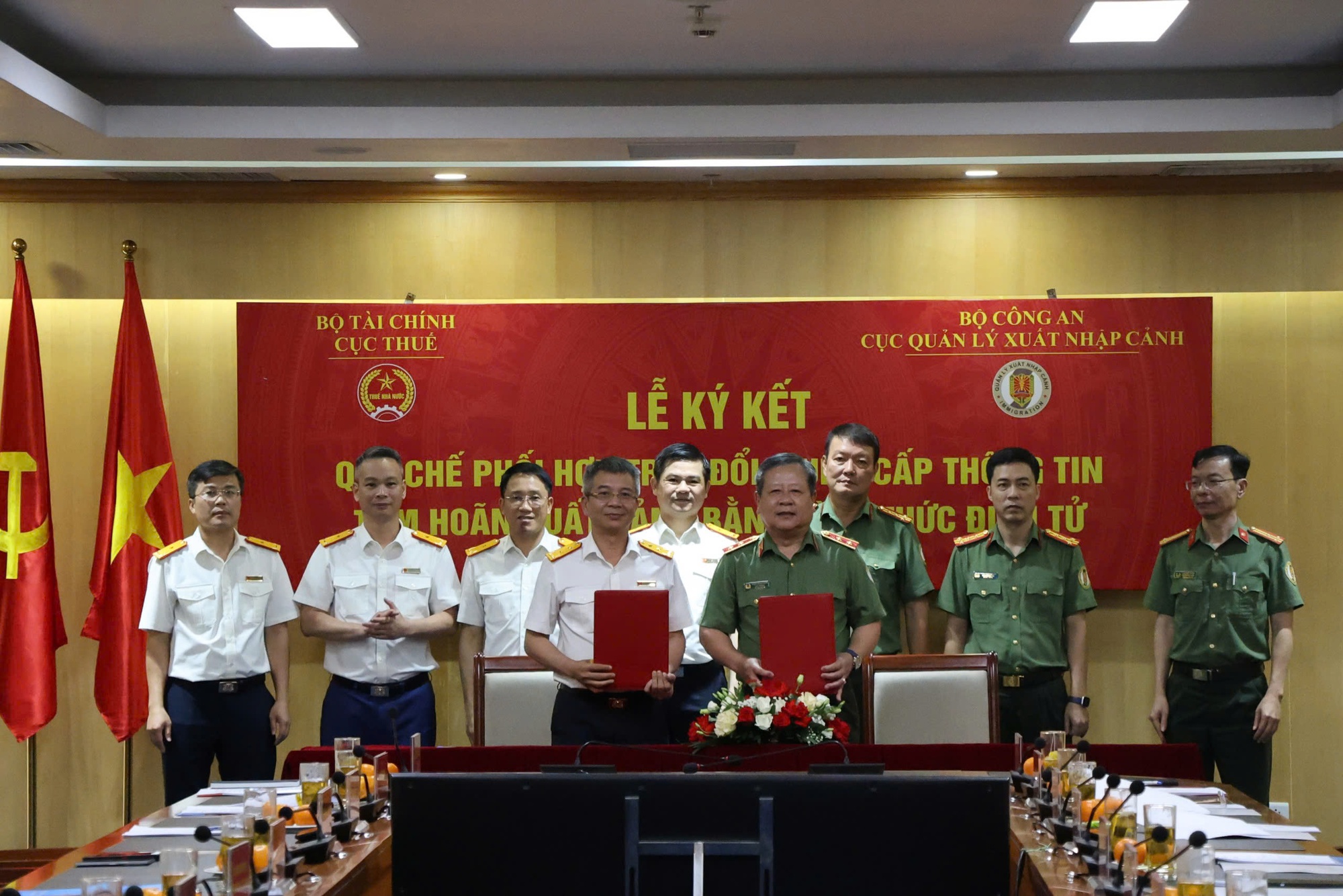 Bước tiến mới trong kiểm soát nợ thuế và xuất nhập cảnh- Ảnh 1. Bước tiến mới trong kiểm soát nợ thuế và xuất nhập cảnh- Ảnh 1.