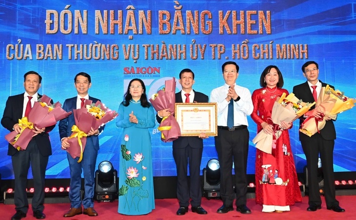 Kỷ niệm 50 năm Ngày Báo Sài Gòn Giải Phóng xuất bản số đầu- Ảnh 2. Kỷ niệm 50 năm Ngày Báo Sài Gòn Giải Phóng xuất bản số đầu- Ảnh 2.