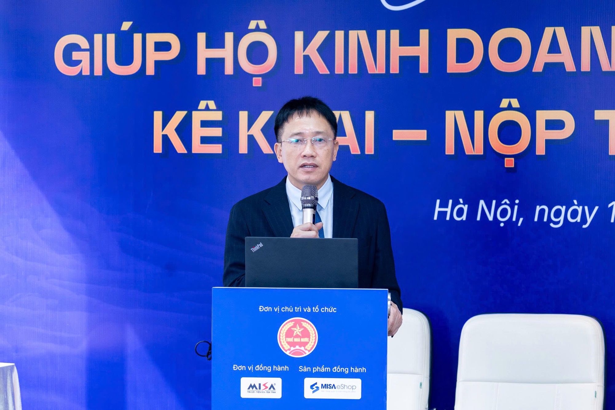 Cục Thuế phối hợp ‘cầm tay chỉ việc’ hộ kinh doanh chuyển sang kê khai- Ảnh 1.