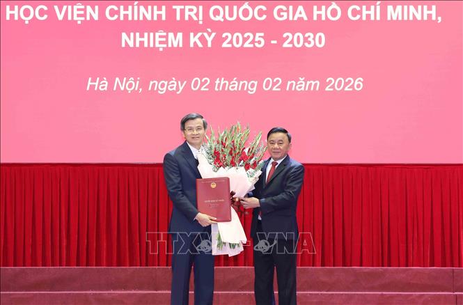 Đồng chí Đoàn Minh Huấn giữ chức Bí thư Đảng ủy Học viện Chính trị quốc gia Hồ Chí Minh- Ảnh 1.
