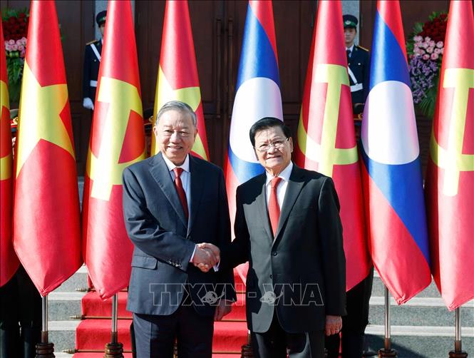 Lễ đón trọng thể Tổng Bí thư Tô Lâm tại thủ đô Viêng Chăn (Lào)- Ảnh 4.