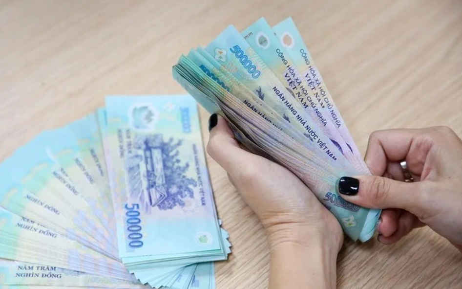 Xếp lương khi ký lại hợp đồng lao động sau sáp nhập