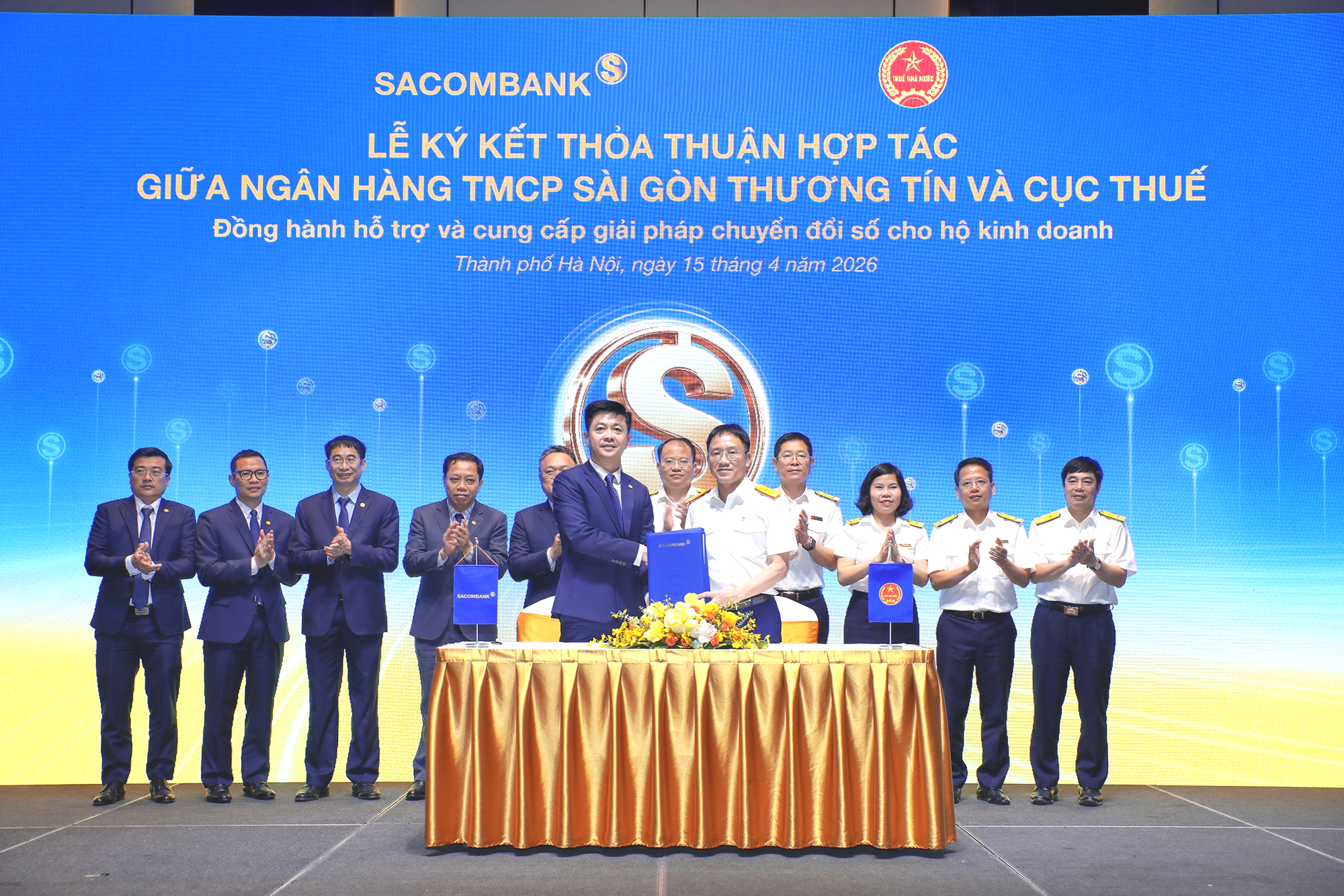 Cục Thuế hợp tác với ngân hàng triển khai giải pháp cho hộ kinh doanh- Ảnh 1. Cục Thuế hợp tác với ngân hàng triển khai giải pháp cho hộ kinh doanh- Ảnh 1.