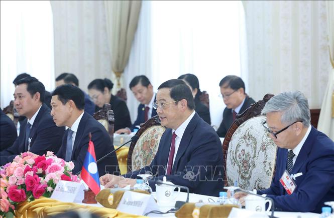 Thường trực Ban Bí thư Trần Cẩm Tú hội kiến Thủ tướng Lào Sonexay Siphandone- Ảnh 3. Thường trực Ban Bí thư Trần Cẩm Tú hội kiến Thủ tướng Lào Sonexay Siphandone- Ảnh 3.