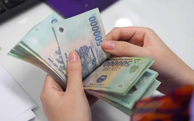 Lương tháng 12 trả tháng 1, tính thuế TNCN năm nào?