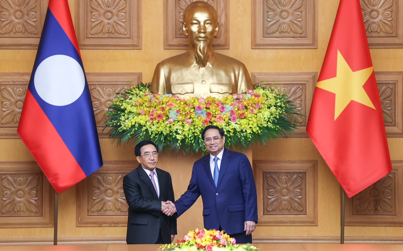 PM Pham Minh Chinh hosts welcome ceremony for Lao counterpart - Ảnh 8.
