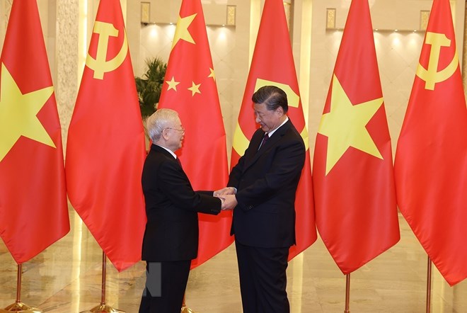 Official welcome ceremony for Vietnamese Party leader - Ảnh 1.