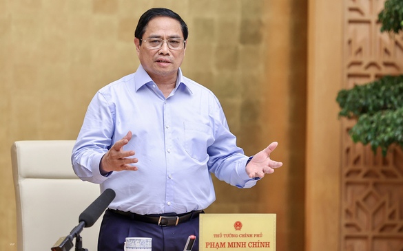 Gov't chief stresses macroeconomic stability, inflation control   - Ảnh 1.