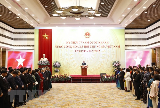 President hosts ceremony in celebration of 77th National Day  - Ảnh 1.