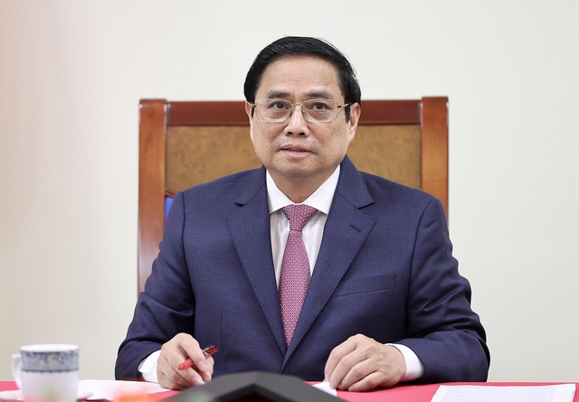 Prime Minister holds phone conversation with Chinese Premier  - Ảnh 1.
