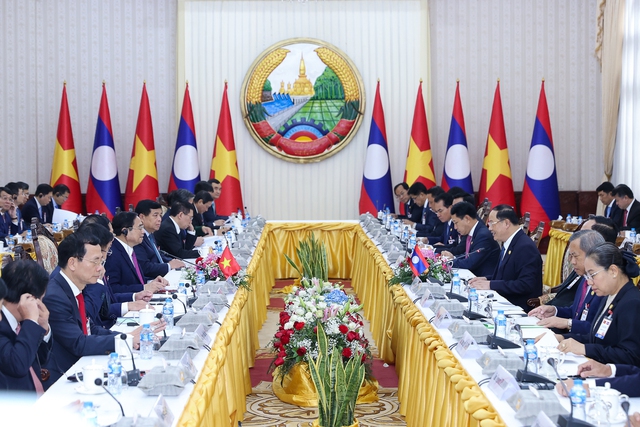 Viet Nam, Laos determined to boost special solidarity and all-around cooperation - Ảnh 1.