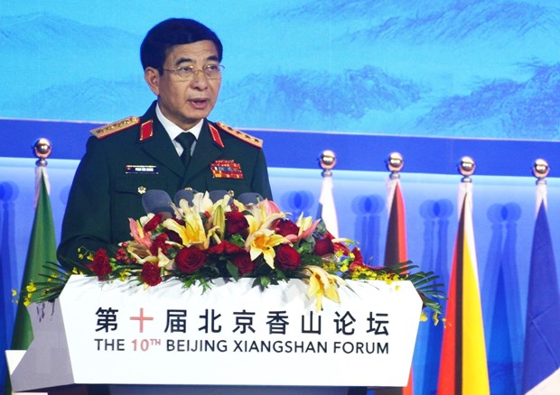 Defense minister attends 10th Beijing Xiangshan Forum - Ảnh 1.