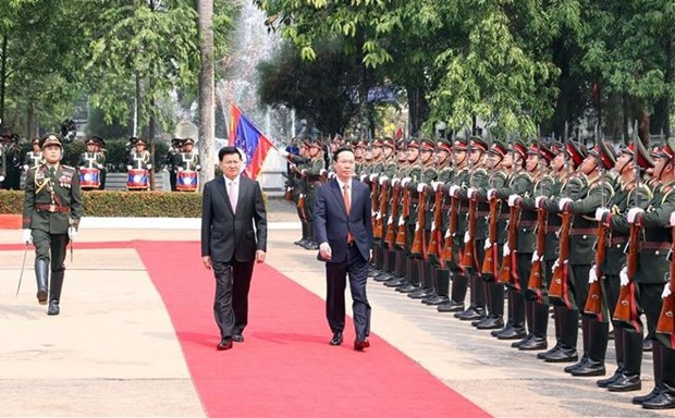 President holds talks with Party General Secretary, President of Laos - Ảnh 2.