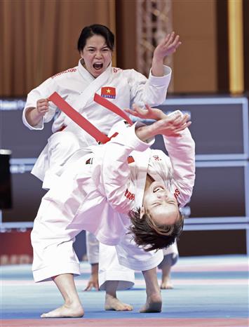 May 7: Viet Nam place fourth with five golds at SEA Games - Ảnh 2.