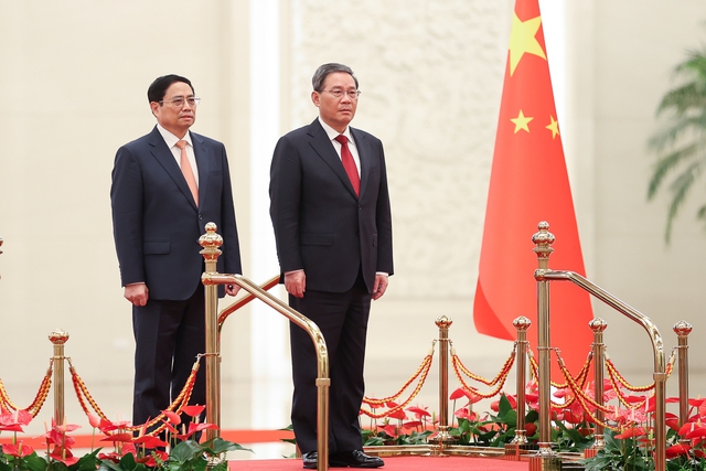 Photos: Official welcome ceremony for Prime Minister Pham Minh Chinh on his China visit - Ảnh 4.