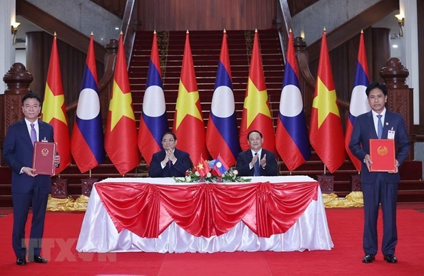 Viet Nam-Laos agreement on mutual judicial assistance in civil matters ratified - Ảnh 1.