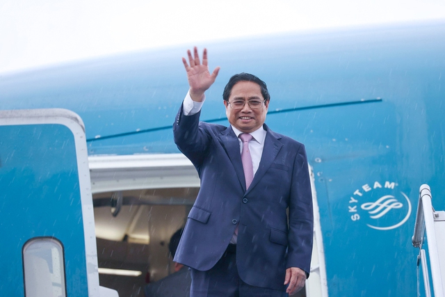 Prime Minister Pham Minh Chinh leaves for 78th UNGA session - Ảnh 1.