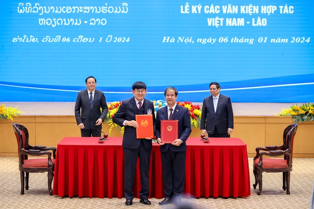 Viet Nam, Laos sign cooperation agreements- Ảnh 4.