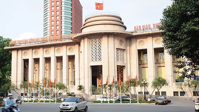 Central bank tightens supervision to prevent significant risks- Ảnh 1.