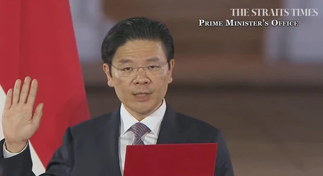 Prime Minister extends congratulations to Singapore’s new PM  - Ảnh 1.