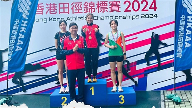 Vietnamese track-and-field team bring home gold from Hong Kong champs- Ảnh 1.
