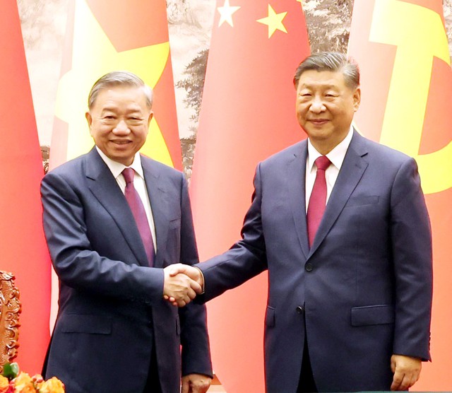 Party General Secretary Xi Jinping hosts counterpart To Lam in China- Ảnh 1.