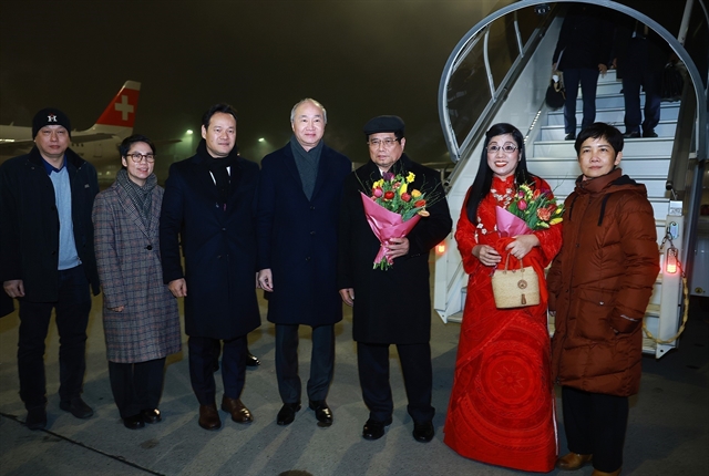 Prime Minister arrives in Switzerland for 55th WEF annual meeting- Ảnh 1.