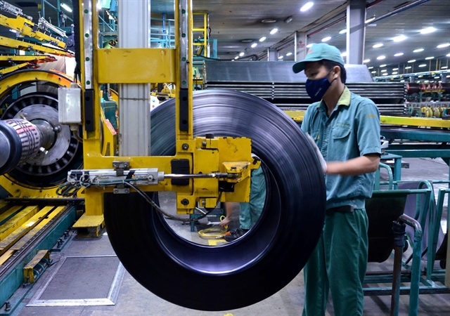 Viet Nam's PMI in December falls to three-month low - Ảnh 1.