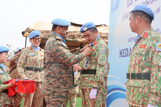 Vietnamese peacekeepers honored with UN medal in South Sudan- Ảnh 1. Vietnamese peacekeepers honored with UN medal in South Sudan- Ảnh 1.