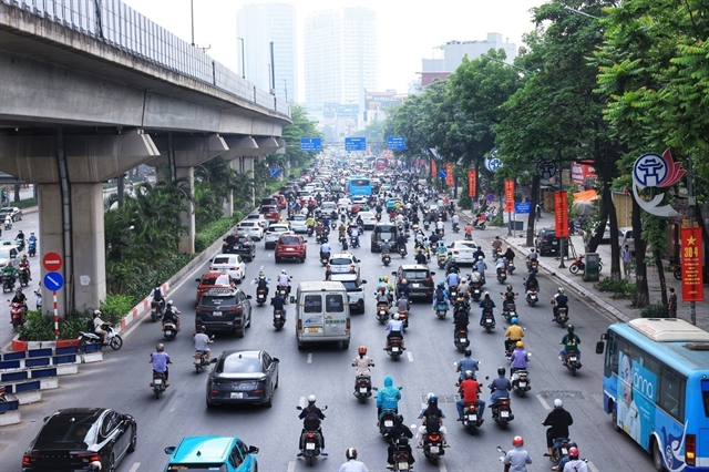 Ha Noi to ban fossil-fuel motorbikes in inner city from July 2026- Ảnh 1. Ha Noi to ban fossil-fuel motorbikes in inner city from July 2026- Ảnh 1.