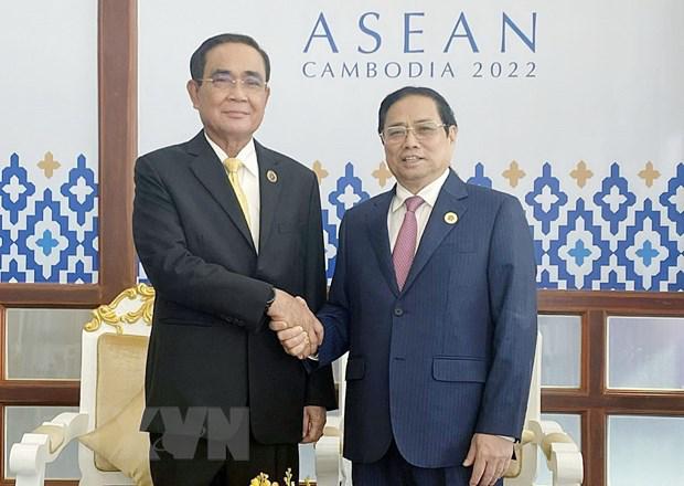 越南政府总理范明正会见泰国总理和马来西亚国会下议院议长 - Ảnh 1.