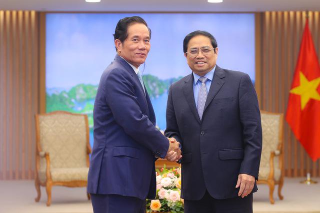 政府总理范明正会见柬埔寨金边市市长坤盛 - Ảnh 1.
