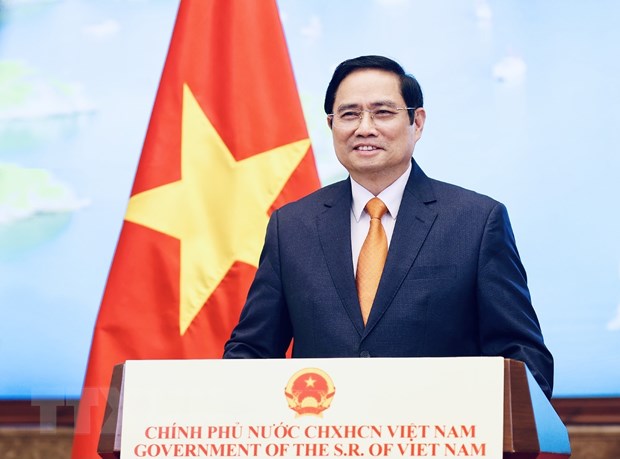 越南政府总理范明正将访问老挝 - Ảnh 1.