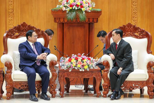 老挝前国家领导：越南老挝特殊团结关系是两国人民宝贵财富 - Ảnh 3.